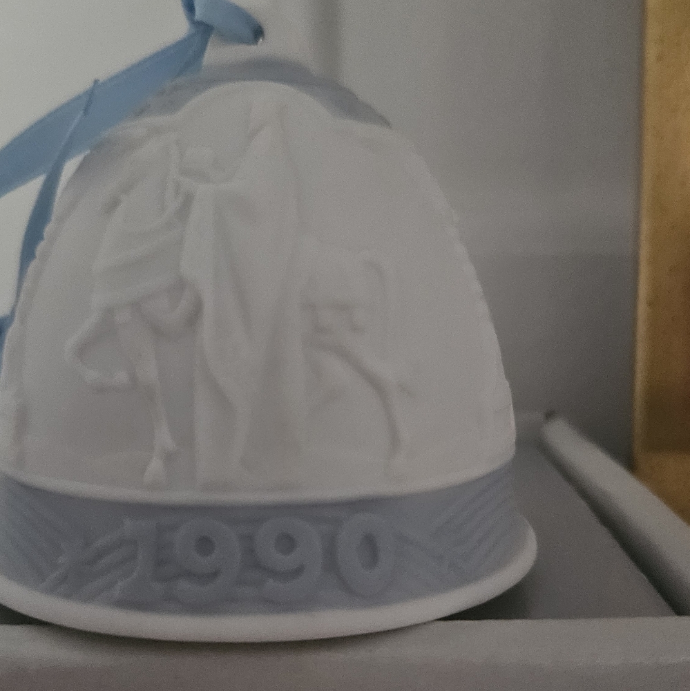 Vintage 1990 Lladro Christmas Bell ornament.